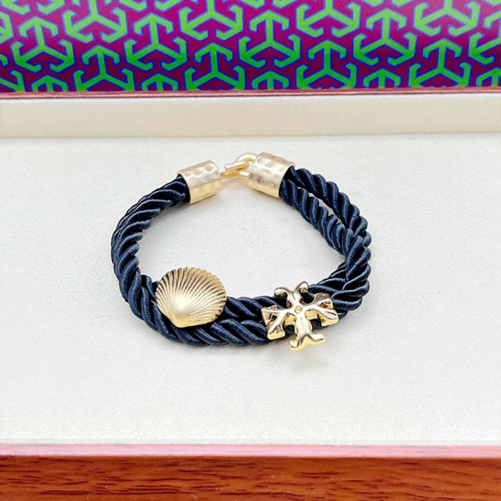 Tory Burch Retro Alphabet Shell Braided Rope Bracelet - Picture 7 of 7